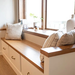 A window seat with drawers under the bench